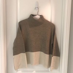 Brown and off-white sweater.